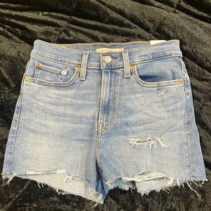 High Rise Blue Ripped Levi Shorts